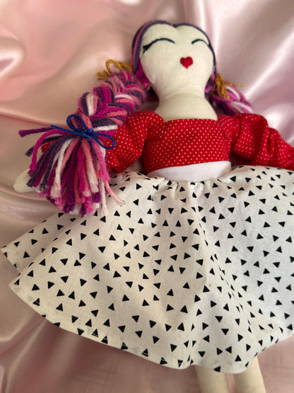 Handmade doll with a red dress 